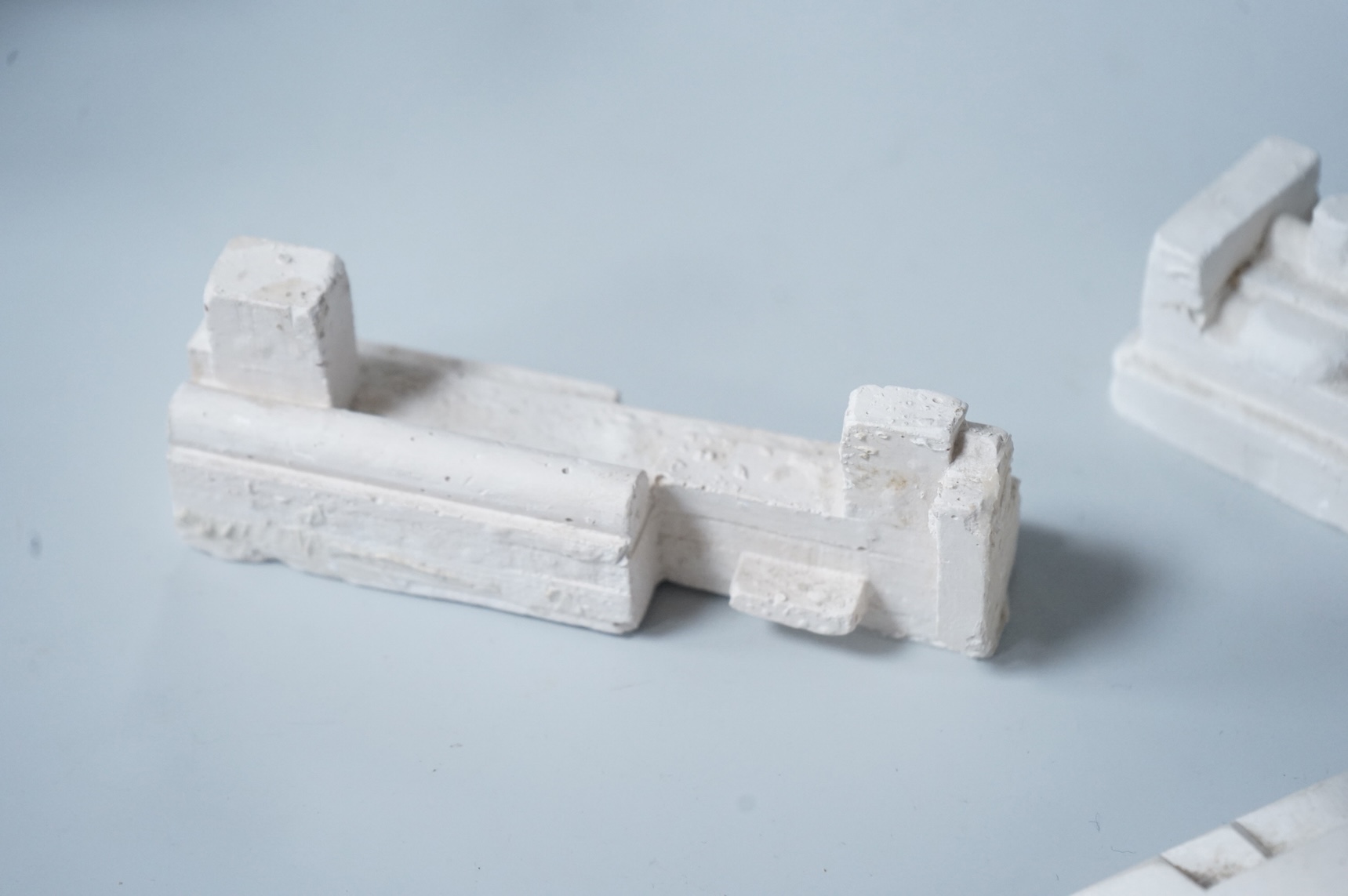 Sir Eduardo Paolozzi RA (1924-2005), three abstract plaster maquettes, signed, largest 12cm wide